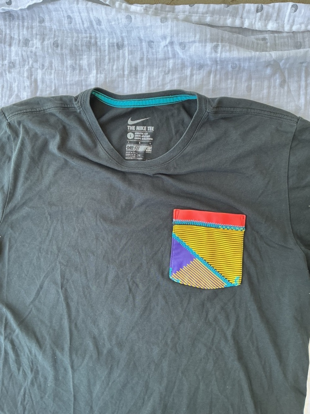 Nike Men’s Black Short-Sleeve Tee with Multicolor Geometric Pocket